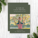 Merry Christmas | Elegant Dark Green Family Photo シーズンカード<br><div class="desc">An elegant modern family photo flat holiday greeting card with a classic typography quote "we wish you a merry christmas... and the happiest new year!" in white. The design has a dark forest green feature color. The photo, greeting and name can be easily customized for a design as unique as...</div>