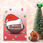 Merry Christmas Football With Santa Hat Card シーズンカード<br><div class="desc">This is a wonderful Christmas card for the football lover! You can customize and personalize the inside message!</div>