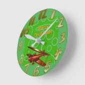 Merry Christmas Red Bi-plane on Green Circles ラウンド壁時計 (傾斜)