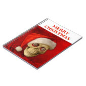 Merry Christmas. Skull wearing Santa hat ノートブック (左側)