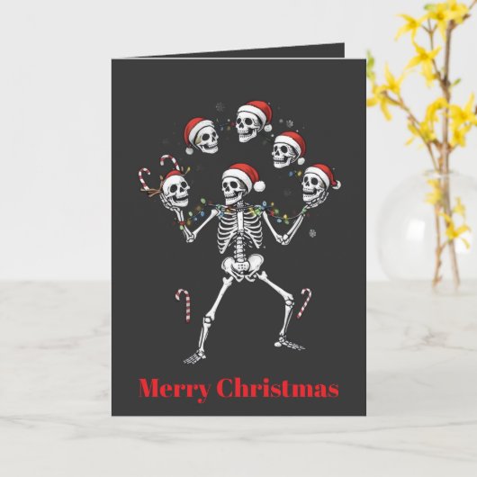 Merry, Juggling Skeleton Spreads Holiday Cheer カード (黄色い花)
