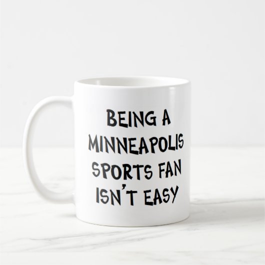 minneapolis sports fan, being コーヒーマグカップ (左)