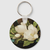 MJ Headeによる青いベルベットの布の上の巨大なマグノリアス キーホルダー (正面)