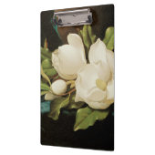 MJ Headeによる青いベルベットの布の上の巨大なマグノリアス クリップボード (左)