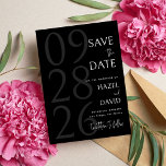 Modern Black and White Minimalist Wedding セーブザデート<br><div class="desc">Announce your special day with timeless elegance using the Modern Black and White Minimalist Wedding Save The Date, designed for couples who appreciate clean design and sophisticated simplicity. Featuring a classic black and white color palette with a refined minimalist layout, this save the date card highlights your names and wedding...</div>