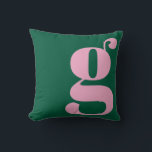 Modern Monogram Initial Letter Preppy Pink Green クッション<br><div class="desc">This preppy monogram pillow features an oversized lowercase initial in pink against a deep green background. The bold, modern letterform adds personality and charm to teen rooms, dorms, and cozy spaces. Its clean, stylish look makes it easy to mix with colorful decor or classic prep accents. A fun, expressive design...</div>