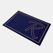 Modern Navy Blue Gold Monogram Script Family Name ドアマット (アングル)