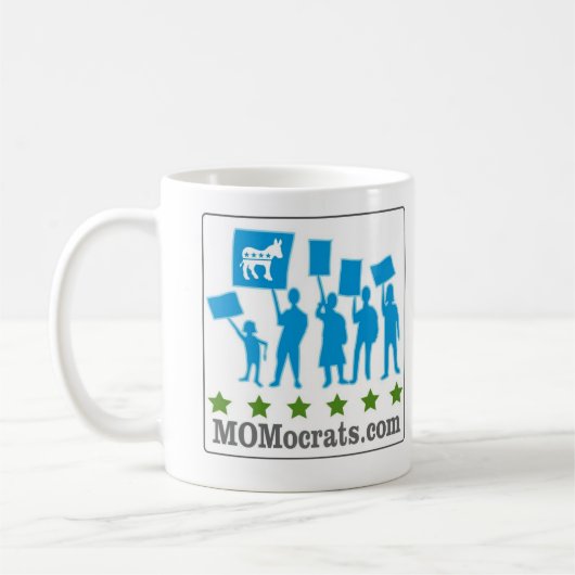 MOMocratsのマグ コーヒーマグカップ (左)