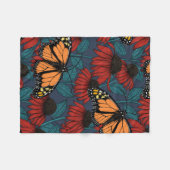 Monarch butterfly on red coneflowers フリースブランケット (正面(横))