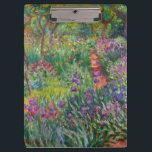 Monet "Givernyのアイリス庭" クリップボード<br><div class="desc">Monetは"Givernyのアイリス庭"が(1899年と1900年の間に絵を描かれる)美しい例であるフランスのな印象派の絵画の創設者でした。 それは色、ライトおよび動きのお祝いです。 MonetがGivernyの財産を購入したときに、彼は既に地面で植わった花園を設計し直しました。 青およびすみれ色の花のための彼の好みはアイリスが付いている彼の春のベッドのほとんどを植えるために彼をインスパイア。 Monetは純粋な顔料の短く、厚い打撃が付いている花を絵を描きました。 この絵画では彼は"日曜日の薄紫の霞"ように記述されているアイリスベッドの地面効果を作成します</div>