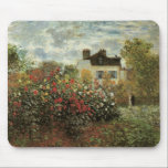 Monet's Garden at Argenteuil by Claude Monet マウスパッド<br><div class="desc">The Artist's Garden in Argenteuil (A Corner of the Garden with Dahlias) (1873) by Claude Monet is a vintage impressionism fine art floral nature painting. A country farm house is in the background. A couple in love is walking past a romantic spring season garden with blooming roses and other flowers....</div>