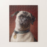 Mops | Carl Reichert ジグソーパズル<br><div class="desc">Mops | Carl Reichert’s Mops is a captivating portrait of a curious-looking pug set against a moody burgundy background. The painting highlights the pug’s expressive face and wrinkled features, rendered with exquisite detail and lifelike texture. The rich tones of the background create a dramatic contrast, emphasizing the playful yet dignified...</div>