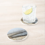 Morro Bay California Ocean Photography コースター<br><div class="desc">A foggy overcast day in Morro Bay California with the ocean waves hitting the rocks on the shore in this beach photograph souvenir. This seaside travel photo keepsake coaster gift features black cursive script above the beach rocks and grey sky.</div>