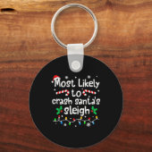 Most Likely To Crash Santas Sleigh C-hristmas Matc キーホルダー (正面)