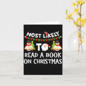 Most Likely To Read A Book On Christmas Funny Snow カード (黄色い花)