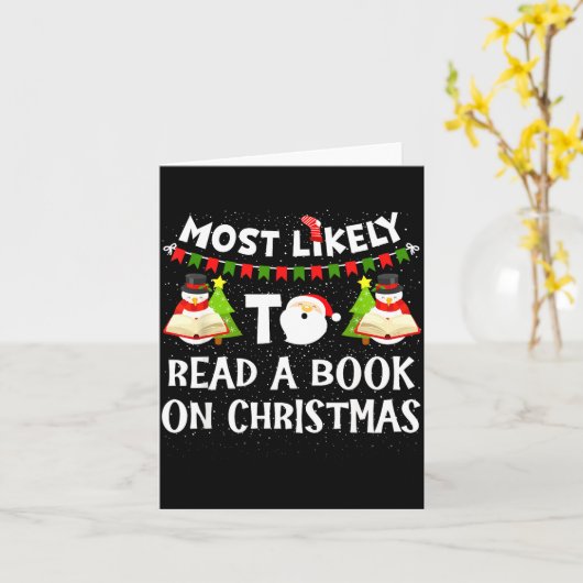 Most Likely To Read A Book On Christmas Funny Snow カード (黄色い花)