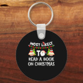 Most Likely To Read A Book On Christmas Funny Snow キーホルダー (正面)