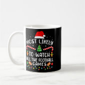 Most Likely To Watch All The Football Games Xmas M コーヒーマグカップ (左)