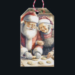 Mr.And Mrs.Clause Cute Christmas to and from ギフトタグ<br><div class="desc">かわいい古いファッションドギフトパーソナライズされたラベル。甘いヴィンテージミスターとミセス・サンタクロースのベーキングクッキーはキッチンで。懐かしいクリスマス与えの雰囲気を味わえる可愛い愛アート。</div>