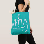 Mrs パーソナライズされた ESTABLISHED – 白オンティール（緑がかった色） トートバッグ<br><div class="desc">ティール（緑がかった色）「ミセス」で白を紹介 トートバッグ – 素晴らし彼女の新しいアクセサリーになるに違いない思いやりあるギフトお気に入りの。女性を念頭にモダン置いてデザインされたこのトートは、スタイル、機能性、パーソナルtouchを組み合わせ、新婚や記念日、あるいは特別なお祝いとして最適なプレゼントとなる。トートは豪華なティール（緑がかった色）やティファニーの青い色で、目を引鮮やかく背景を提供している。この美しい色合いは、トレンドだけでなく、汎用性も高く、さまざまな衣装や大事な行事を補完する。カラーティール（緑がかった色）は静寂と洗練を象徴し、ファッショナブルで意味のあるアクセサリーとなっている。この背景に素晴らし描かれている言葉は白いレタリングの「ミセスエレガント」である。このシンプルデザインは祝、彼女の結婚の新しい旅に影響を与え、彼女の婚姻資格のお祝いとして結婚する花嫁のための理想的な贈り物となっている。白い文字コントラストはティール（緑がかった色）の背景に美しく映し出され、印象的で印象的なデザインを作りエレガント出す。この点を際立たせるのは、バッグに感傷的なtouchを加えパーソナライズされたた「定年」のカスタマイズである。この機能は彼女の年を記念結婚し、贈り物だけでなく、愛と団結の物語を伝える大切な記念品を作ることができる。品質と実用性を念頭に置いて作られたトートは広くて耐久性があり、日常的に使用するのに最適。彼女の使いランニング物、仕事に向かう、週末の休暇のための荷造りなど、このトートは彼女の要運素を簡単に設計されている。この「ミセス」 トートバッグは単なるアクセサリーではなく、愛の声明、新しい章のお祝い、そして彼女の毎日の冒険のための多彩な仲間である。</div>