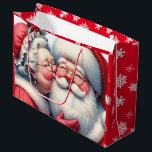 Mrs Clause Santa Cute キスをする Christmas ラージペーパーバッグ<br><div class="desc">ミセス・ク与えジョーンのキスはサンタの頬に。雪赤と白の背景。懐かしいクリスマス与えの雰囲気を味わえる可愛い愛アート。</div>