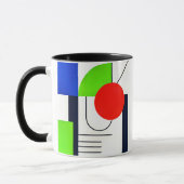 Mug aux designs géométriques en couleurs. マグカップ (左)