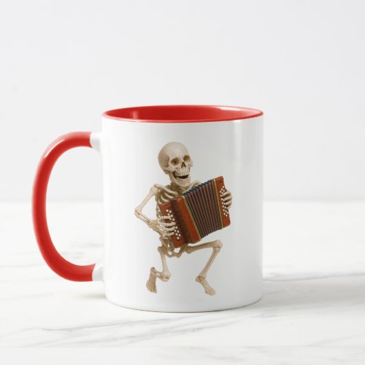 Mug avec un squelette au rythme de la musique. マグカップ (左)