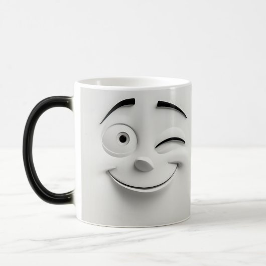 Mug Magic Winking Cartoon Face 3D モーフィングマグカップ (左)
