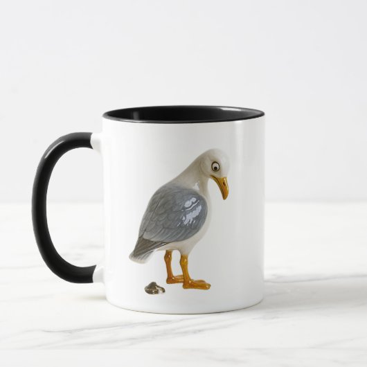 Mug mouette jette un oeil sur sa fiente. マグカップ (左)