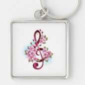 Musical treble clef notes with Sakura flowers キーホルダー (正面)