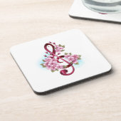 Musical treble clef notes with Sakura flowers コースター (左側)