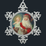 Myraの司教のBabyイエス・キリストセントニコラス スノーフレークピューターオーナメント<br><div class="desc">ベビーイエス・キリストを握る美しいヴィンテージのクリスマスのイメージセントニコラス(サンタクロース) 
彼の腕。</div>