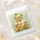 Natasha Usによる熟したバナナとしてのテディ フェイバーバッグ (クリップ留めされた状態)