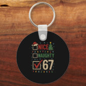 Naughty Nice 67 Christmas Humor  キーホルダー (正面)