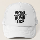"Never Underestimate Dumb Luck" Saying キャップ (正面)