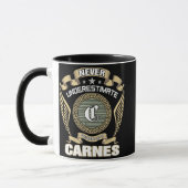 NEVER_UNDERESTIMATE_POWER_OF_A_CARNES マグカップ (左)