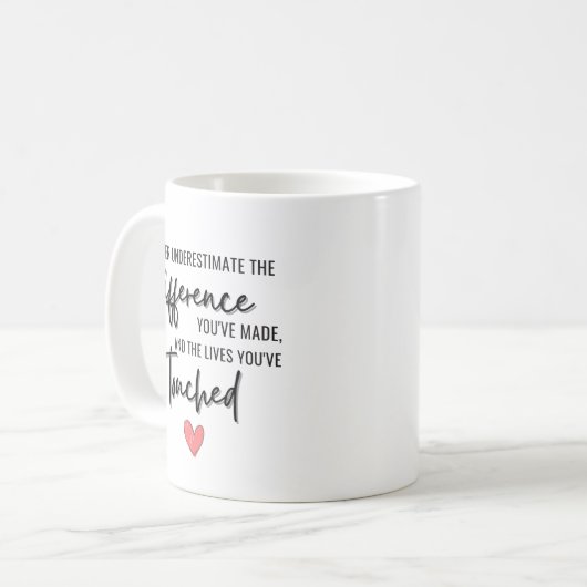Never Underestimate the Difference Retirement コーヒーマグカップ (正面左)