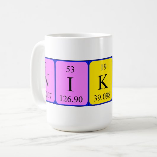 Nikkiの周期表の名前のマグ コーヒーマグカップ (正面左)