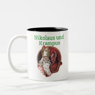 NikolausおよびKrampusのドイツ人のクリスマス ツートーンマグカップ