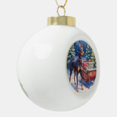 Noble Doberman Guarding Christmas Sleigh Winter セラミックボールオーナメント (左)