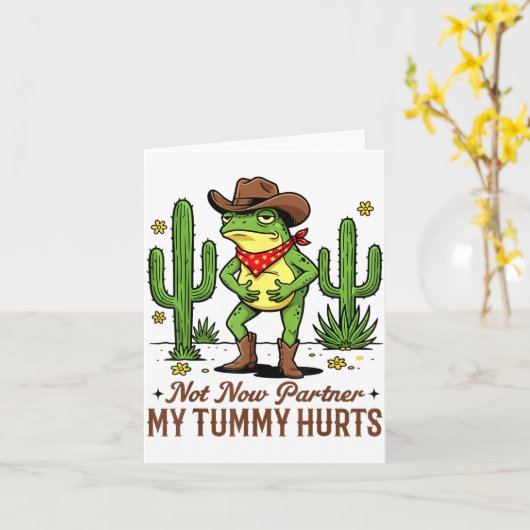 Not Now Partner My Tummy Hurts Funny Cowboy Frog M カード (黄色い花)