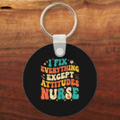 Nursing Humor Retro Groovy I Fix Everything Except キーホルダー (正面)