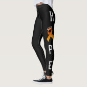 OASOTAによるオレンジリボンの希望のLEGGINS レギンス (左)