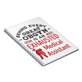 OBGYNの素晴らし疲れ果てた医療助手の後ろに ノートブック (右側)