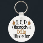 Obsessive Cello Disorder キーホルダー<br><div class="desc">A funny cello Christmas present for the great cellist in your life. This cute Obsessive Cello Disorder gift features the instrument next to the humor phrase.</div>