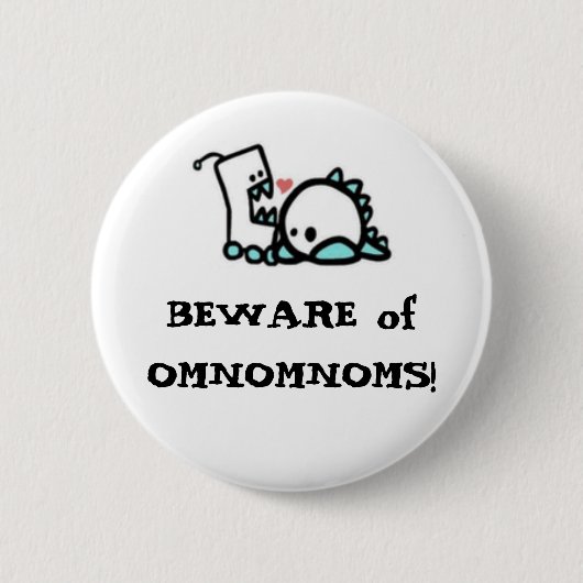 OMNOMNOMSの用心して下さい! 缶バッジ (正面)