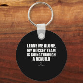 (on Ck) Leave Me Alone My Hockey Team Is Going Thr キーホルダー (正面)