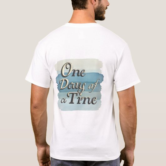 One Day at a Time やる気を起こさせる引用文Tシャツ Tシャツ (裏面)