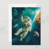 Orange cat floating in space with debris シーズンポストカード (正面/裏面)
