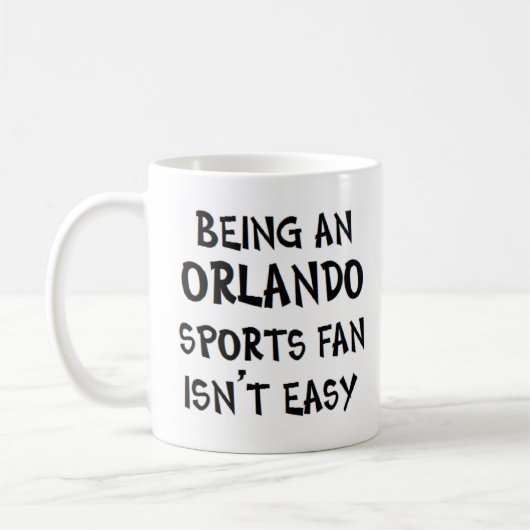 orlando sports fan, being コーヒーマグカップ (左)